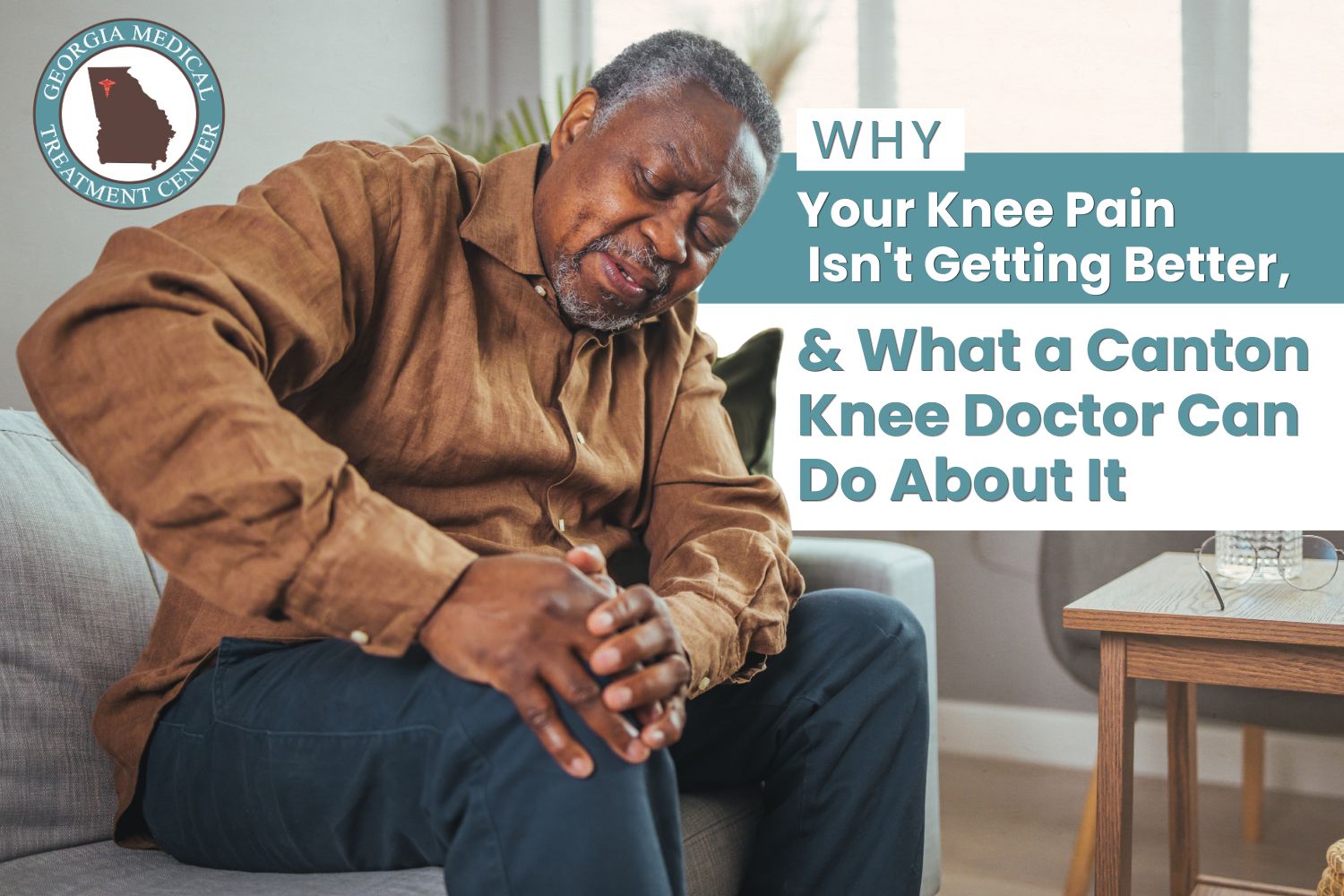 Why Your Knee Pain Isn’t Getting Better and What a Canton Doctor Can Do About It Older man sitting on a couch holding his knee in pain, with text reading Why Your Knee Pain Isn't Getting Better and What a Canton Knee Doctor Can Do About It